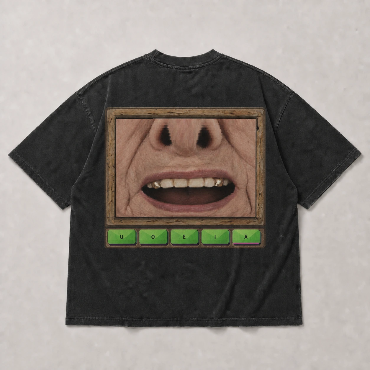 Back of the oversized black Vowler T-shirt with a large framed vowel face print